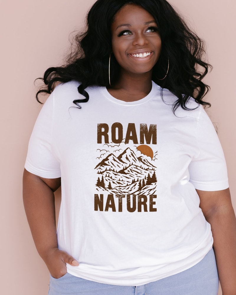 Front of a model wearing a size XL Roam Nature Mountains in White by Simply Sage Market. | dia_product_style_image_id:281313